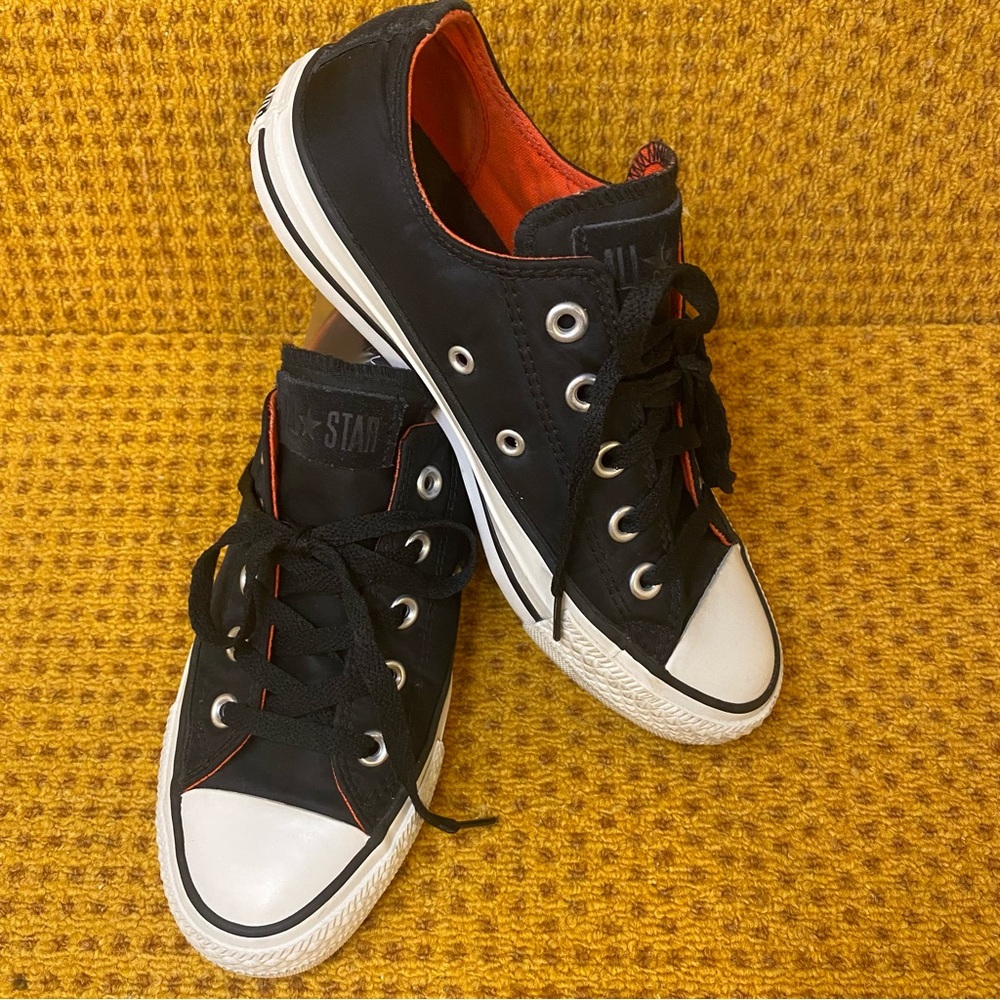 Converse All Star low cut black and red nylon sneakers. Women’s 6  Men’s 4